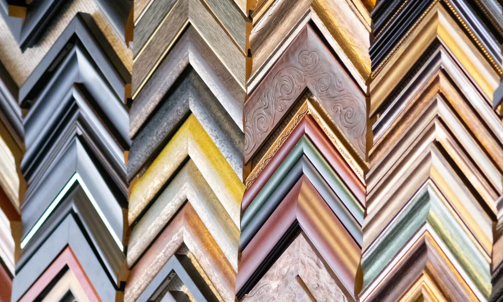 Frame samples on the wall at Magnolia House in Fuquay-Varina